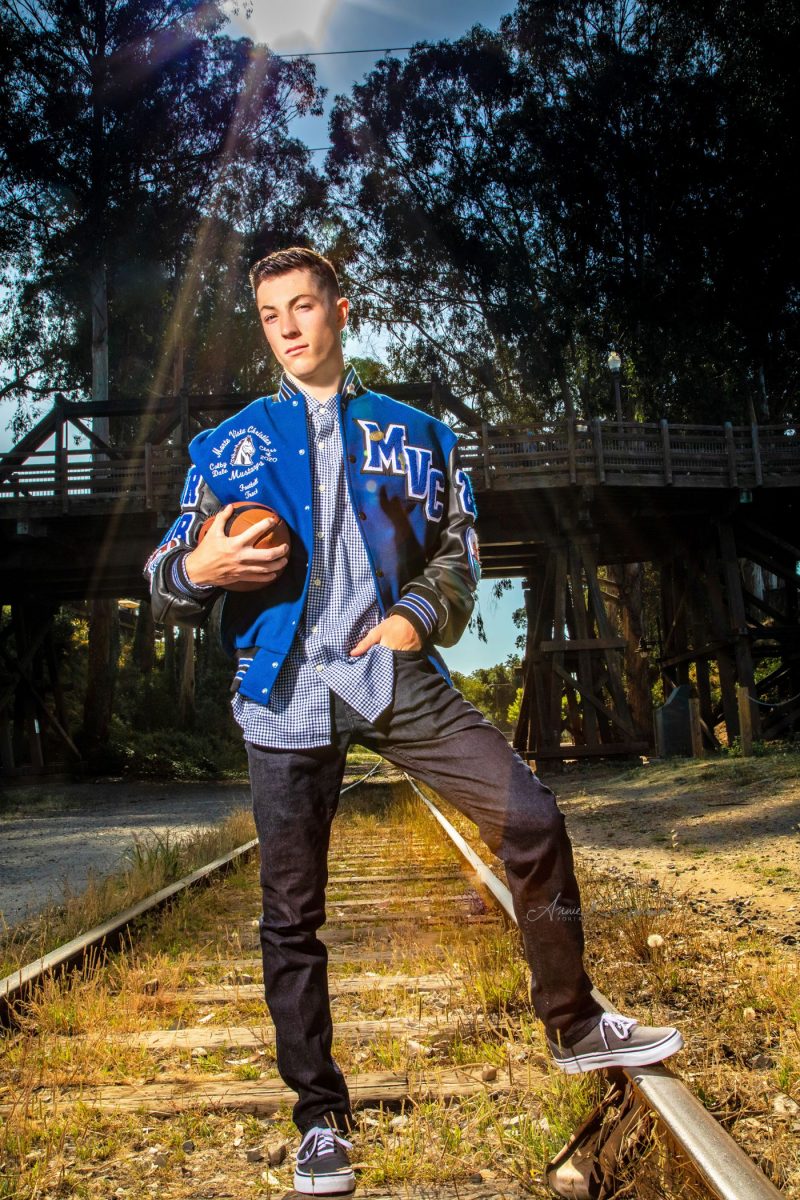 High School Senior boy nest to train tracks