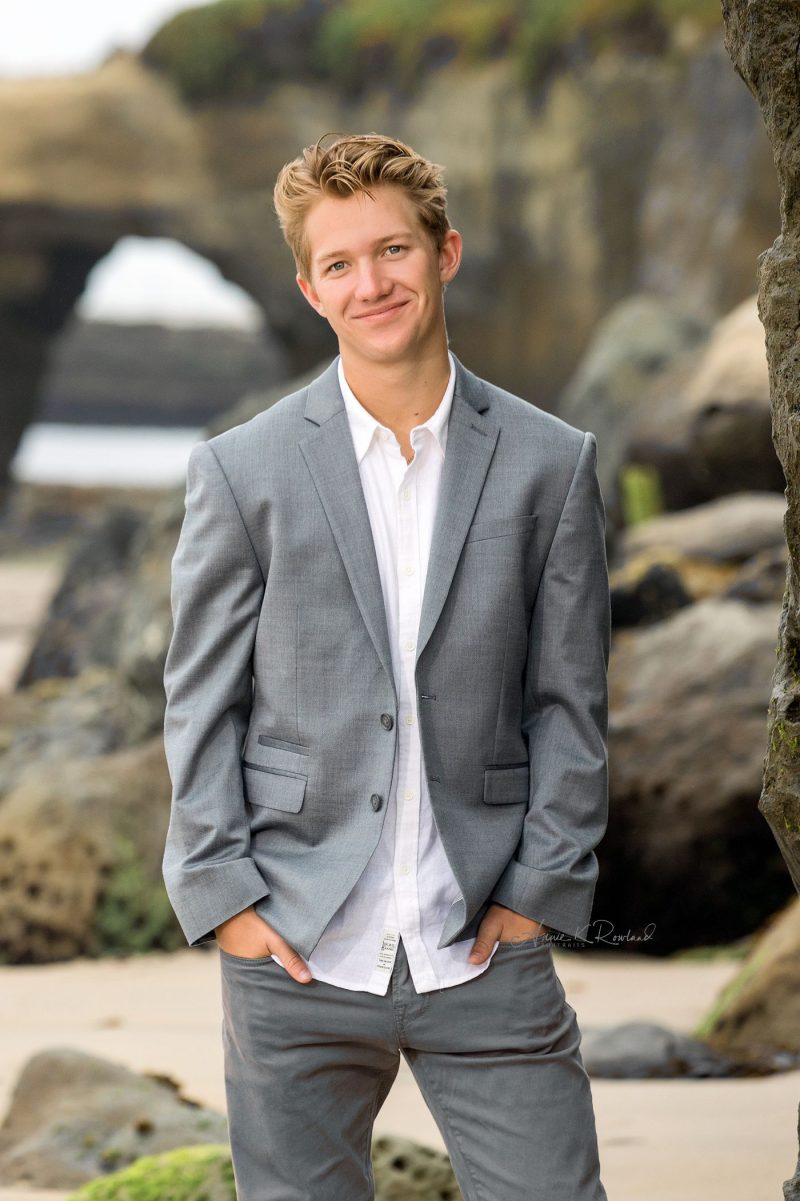 High school Senior boy on beach in santa cruz