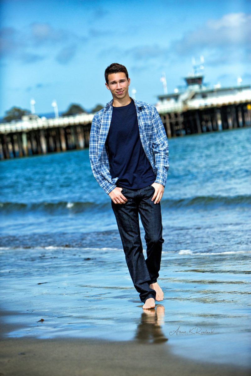 High school Senior boy on beach in santa cruz