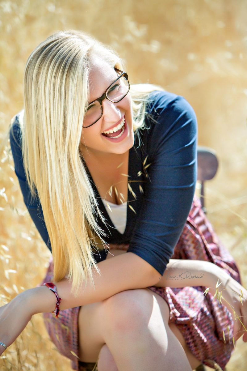 High school senior portrait of girl laughing