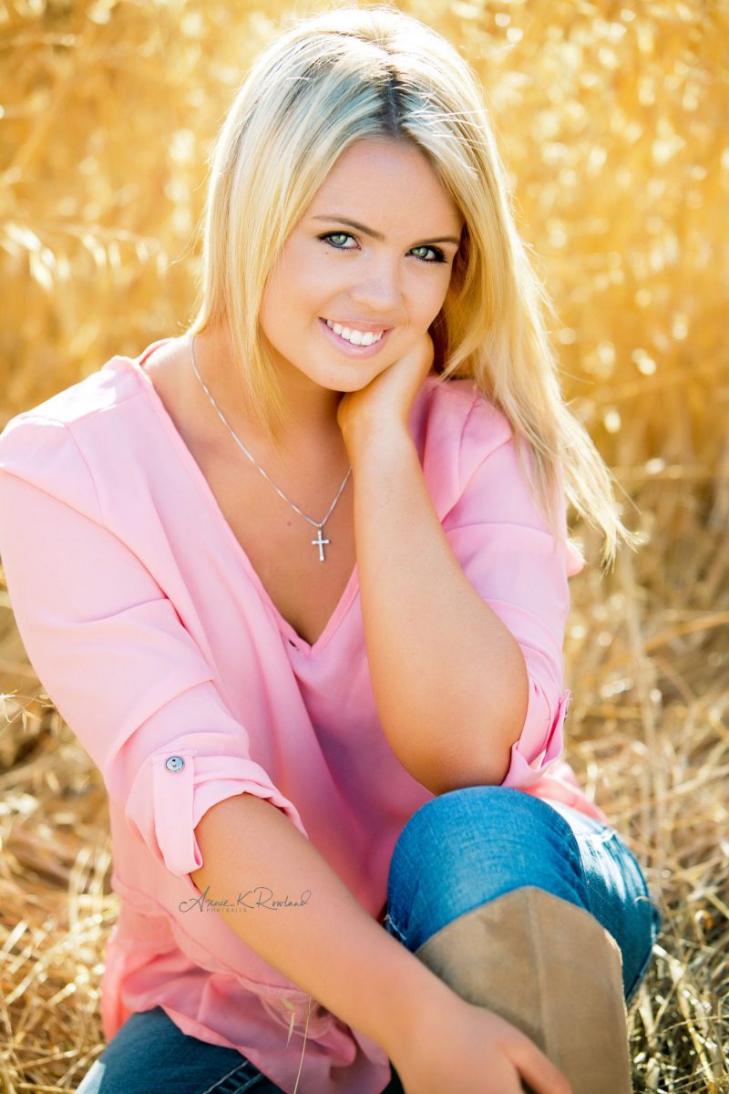 High school senior portrait In grasses in Santa cruz